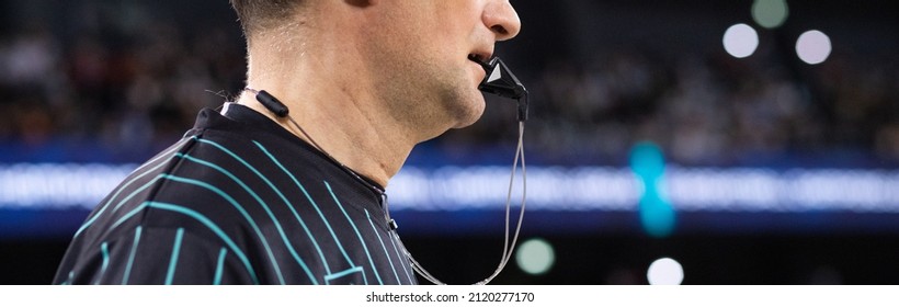 Close Up On Whistle In Referee Mouth