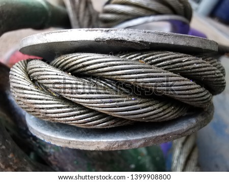Close up on Wire rope sling surface. Lifting gear and equipment in heavy industrial. Selected macro focus on the object.