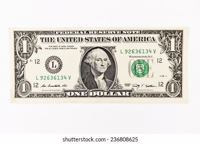 Close up of one dollar isolate on white background.  - Shutterstock ID 236808625