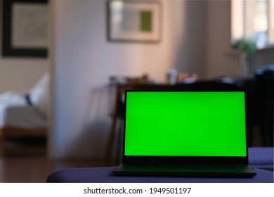 Close Up One Green Screen Laptop Computer At Home Living Room