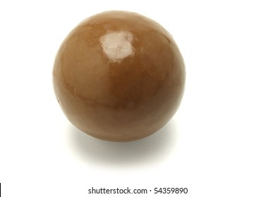 Close Up Of One Large Chocolate Ball On White Background