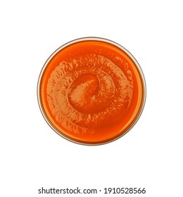 Close Up One Transparent Glass Bowl Of Orange Sweet Chili Or Sriracha Sauce Isolated On White Background, Top View, Directly Above