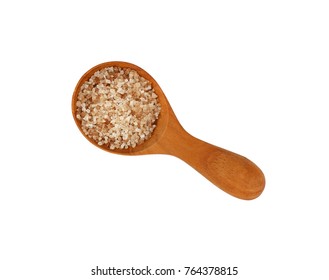 Close Up One Wooden Scoop Spoon Full Of Brown Smoked Danish Salt Isolated On White Background, Elevated Top View, Directly Above