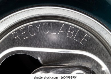 A Close Up Of A Open Aluminium Can Where You Can Read The Word 