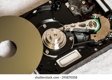 Close up of open computer hard disk drive (HDD). Inside harddisk