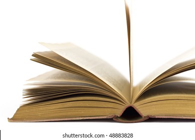 close up of an opened vintage book on white background,selective focus - Powered by Shutterstock