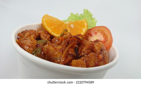 Close Up Of Orange Chicken On The Paper Bowl - Isolated On White Background.