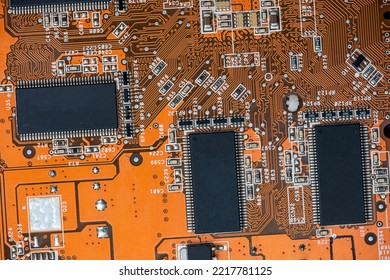 close up of Orange circuit board, motherboard technology background. computer component - Shutterstock ID 2217781125