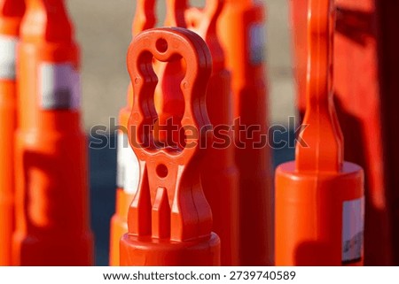 Close Up of Orange Traffic Delineator Posts at Road Construction Site