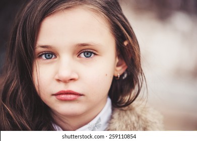 Close Up Outdoor Portrait Of Adorable Caucasian Child Girl