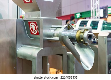 Close Up Outlet Tube Or Discharge Gate Of Automatic Commercial Meat Grinder Or Masher Machine For Food Industrial