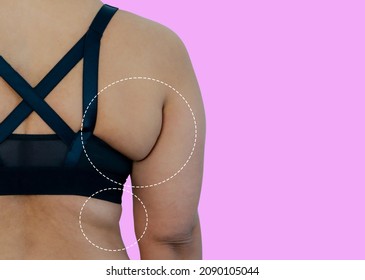 Close up overweight  woman in sport bra from back wearing wrong size of brassiere made meat folds out on back, excess weight fat woman, small bra on fat body. 