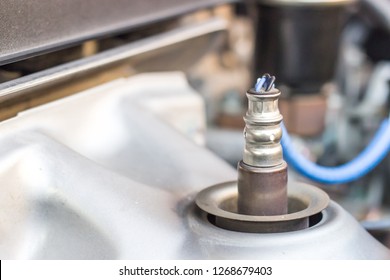 Close up Oxygen or intake sensor of car in engine room part of automobile concept for texture 