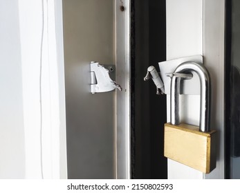 Close Up Padlock Is Broken But The Door Buckles Are Destroyed.The Door Lock Was Broken.Break The Key Hinge To Steal.