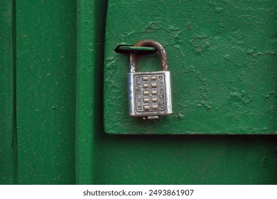 close up of padlock with numeric combination keys                                