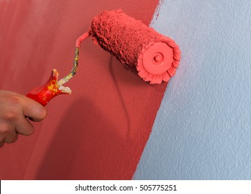 Close Up Paint Roller On The Wall.
