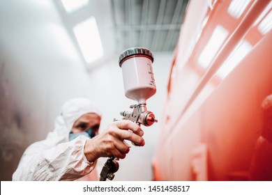 Close Up Of Paint Spray Gun, Worker Painting A Car