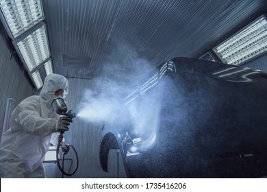 Close Up Of Paint Spray Gun, Worker Painting A Car