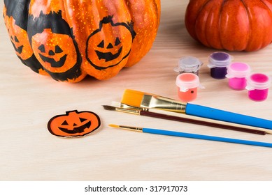 Close Up Of Painting A Pumpkin For Halloween.