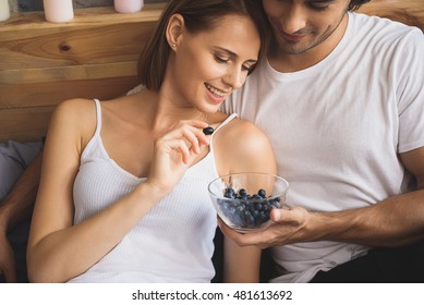 Close Up Of A Pair Eating Blueberries