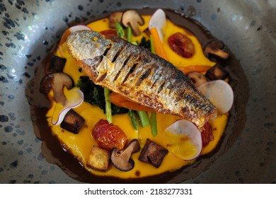 Close Up Pan Seared Sea Bass Steak Served With Pumpkin Puree