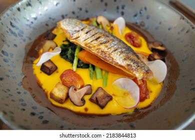 Close Up Pan Seared Sea Bass Steak Served With Pumpkin Puree