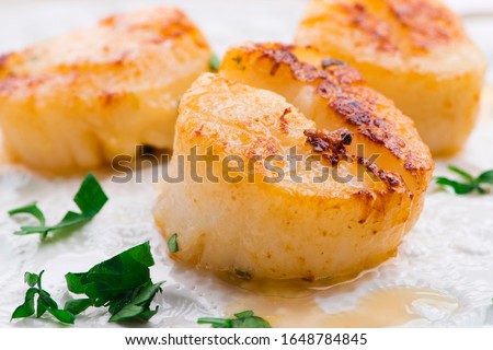 Close up of pan seared sea scallops