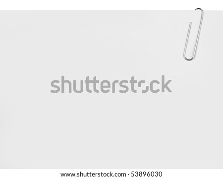 Close up of paper clip holding a blank paper sheet