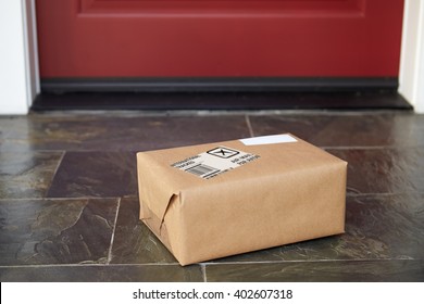 Close Up Of Parcel Delivery Outside Front Door