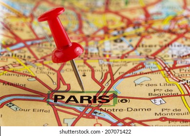 Close Up Of Paris Map With Red Pin