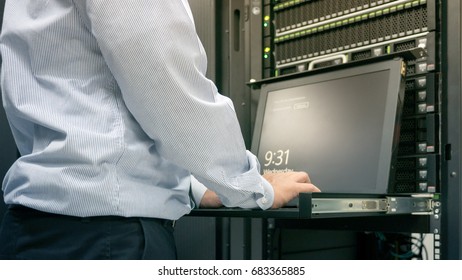 Close up part of administrator working in data center