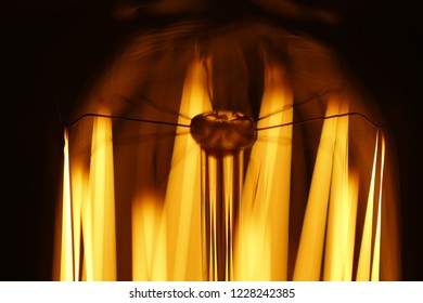 A close up of part of a light bulb.
