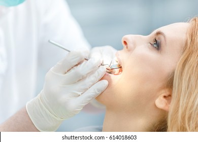 Close Up Partial View Of Beautiful Woman At Dental Check Up  