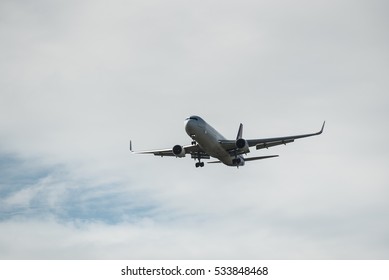 Close Up Of Passenger Plane Landing Overhead