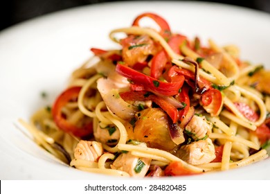 Close Up Of Pasta With Chicken And Arugula