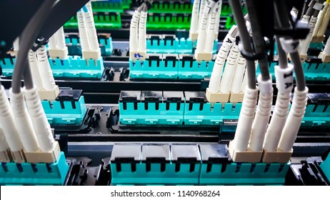 Close up patch fiber optic cable in server room , empty port