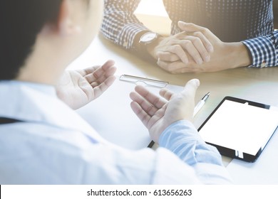 close up of patient, doctor explaining about disease in a hospital or clinic. - Shutterstock ID 613656263