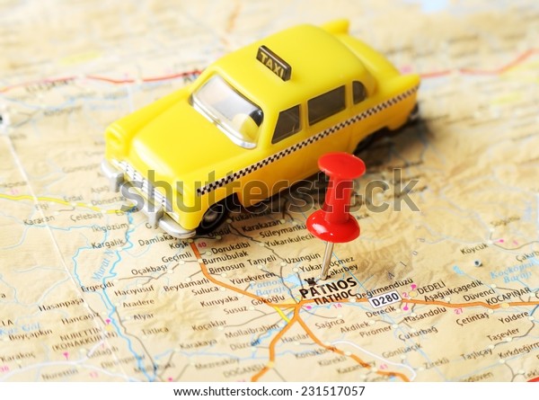 Close up of  Patnos ,Turkey  map with red pin and\
a taxi    - Travel\
concept