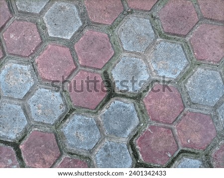 Close up of paving blocks neatly arranged on the street. Texture