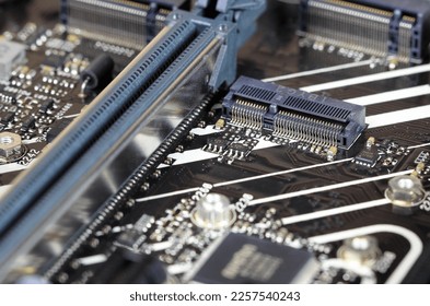 close up PCIe M.2 e key frmale connector interface for Mini PCIe WiFi module on modern high performance computer. - Shutterstock ID 2257540243