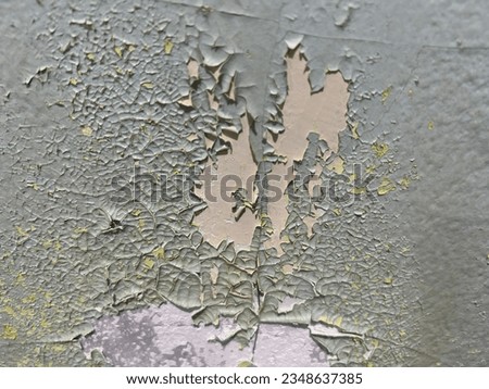 close up of pealed paint on the old wall