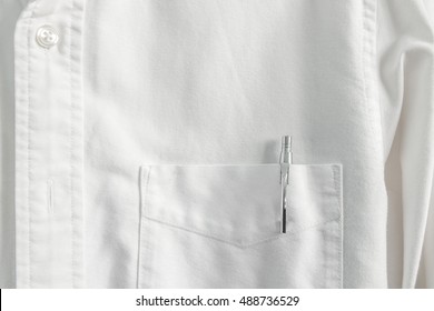 Close Up Pen In Pocket On White Shirt