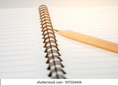 Close up a pencil for work on a notebook.