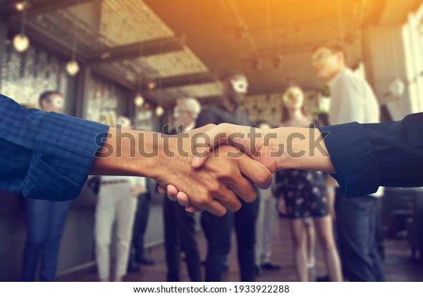 Close up people hands shake business partnership\
success, Shake hand\
concept