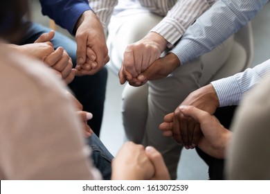 Close Up People Sit In Circle Holding Hands Participating At Group Therapy Session. Receiving Sharing Psychological Support, Go Through Addiction Together, Help Each Other Overcome Dependence Concept