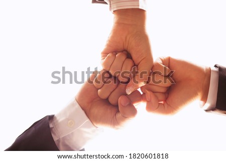 Similar – hands intertwined wedding couple on wedding day