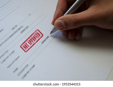 A close up person hand singing a contract  - Shutterstock ID 1953544315