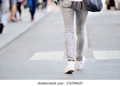 Close Up Of Person Walking On Street