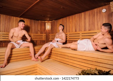 Close Up Photo Of 3 Men Resting In Russian Sauna 