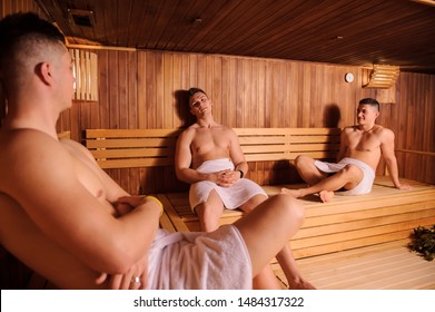 Close Up Photo Of 3 Men Resting In Russian Sauna 